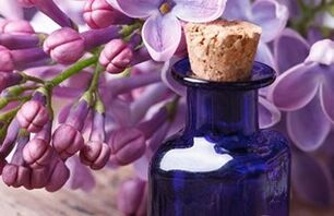 Tincture on lilac flowers for wiping sick nails